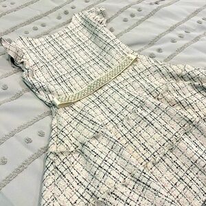Beautiful girls party dress. Cream with black & pink tweed print. Removable belt